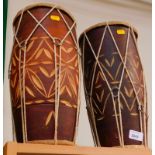 A pair of tribal style drums.
