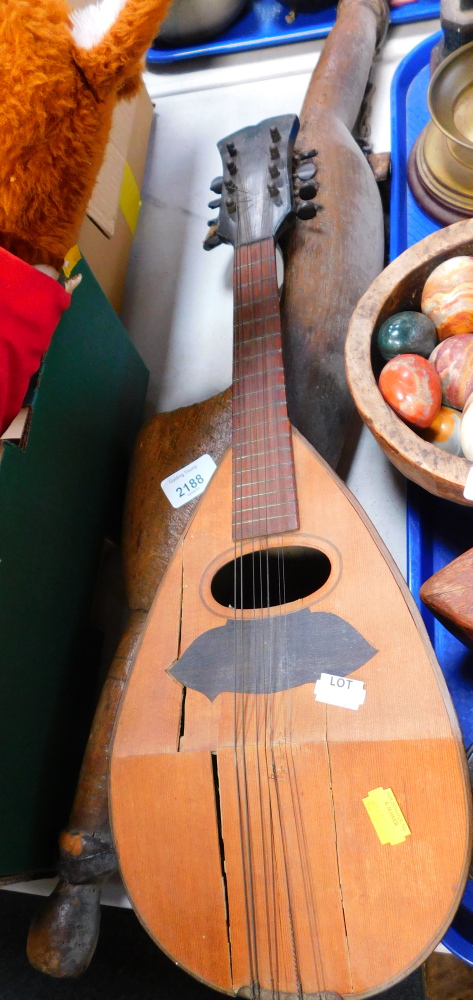 A vintage yoke and an early 20thC mandolin, partially ebonised. (2)