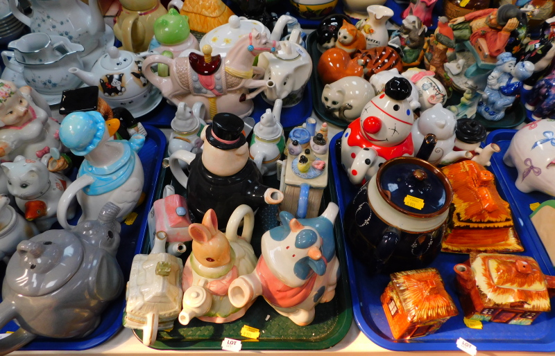 A quantity of novelty teapots, to include elephant, mother goose, rabbit, quantity of cottage ware,