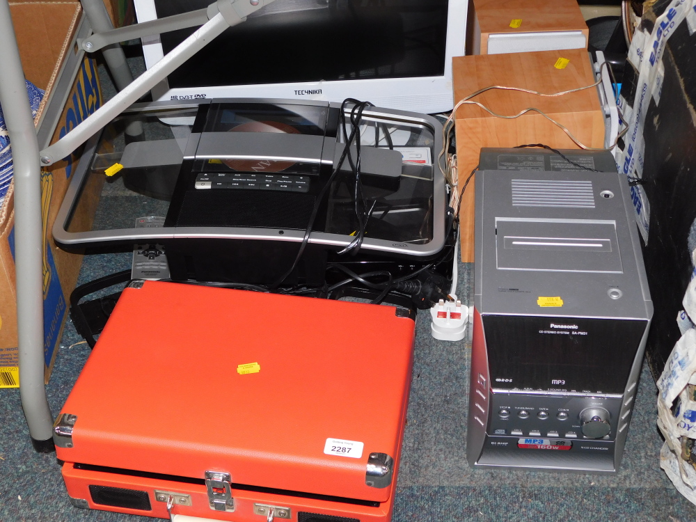 A Panasonic CD player, Grosley portable record player, a Tecknika television, etc. (7)