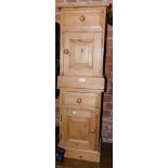 A pair of pine bedside cabinets, 58cm high, 36cm wide, 28cm deep.