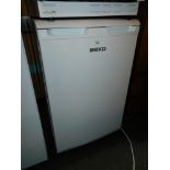 A Beko under counter fridge, model RA610W.