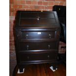 An early 20thC dark oak bureau, 46cm high, 61cm wide, 39cm deep.