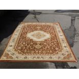 A Sample Tat Carpets Turkish wool rug, cream ground with repeating floral borders, 300cm x 201cm.