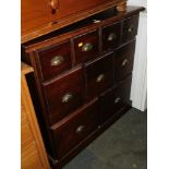 A pine chest of nine drawers, of graduated sizes, raised on a plinth base, 84cm high, 88cm wide, 41c