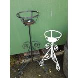 A wrought iron garden planter, and another smaller in white. (2)
