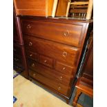 A Stag mahogany chest of drawers, two over three over two, 111cm high, 83cm wide, 47cm deep.