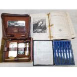 A cased set of plated butter knives, a gentleman's cased vanity set, and a copy of Bunyan (John). Th