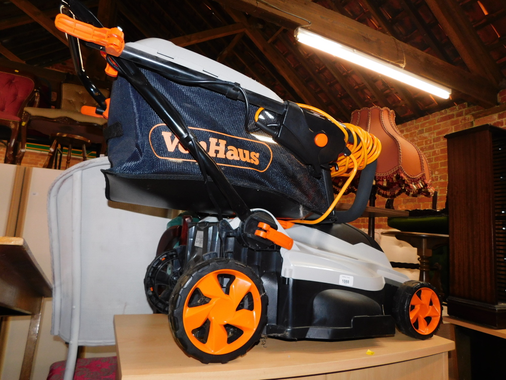 A Von Haus electric rotary lawnmower.