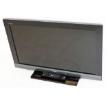 A Sony Bravia 31'' television, with remote control.