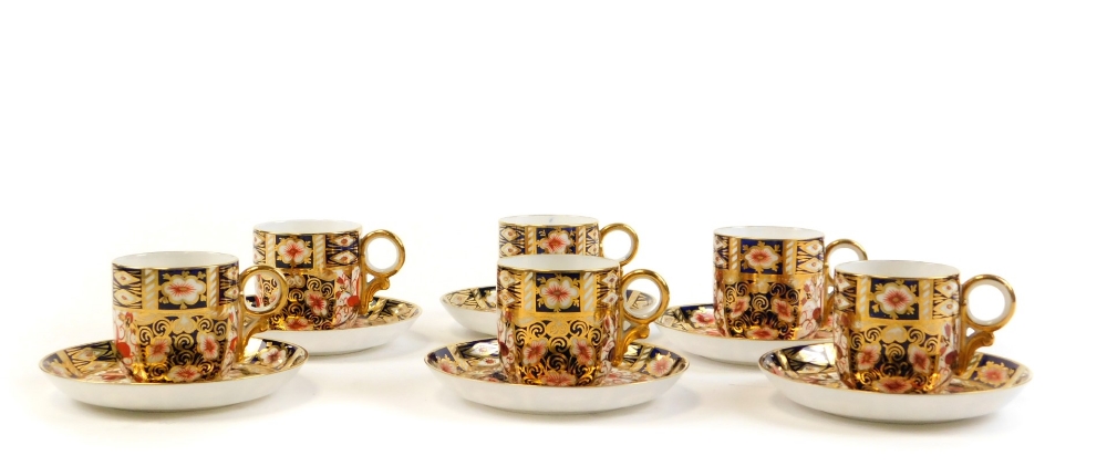 A set of six Royal Crown Derby Imari pattern coffee cans and saucers, the coffee cans 6cm high, the