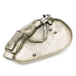 A golfing interest pewter ash or pin tray, cast with golf clubs in caddy bag, and three balls in a b