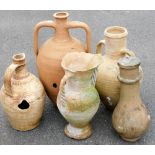 Various amphora and other garden pots. (AF, 5)