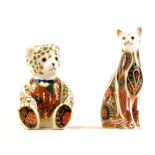 Two Royal Crown Derby paperweights, to include a cat with red stamp numbered LIX with silvered butto