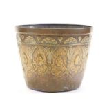 An Art Nouveau style brass planter, 21cm high, 26cm diameter.