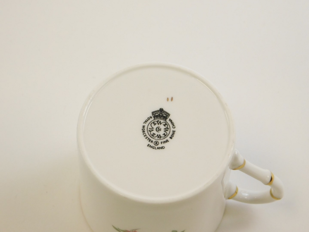A part set of Royal Worcester coffee cans, comprising six saucers with gilt decoration and floral de - Image 2 of 3