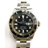 A 1979 Rolex Submariner model 1680, serial 61582**, having stainless steel case and Oyster bracelet