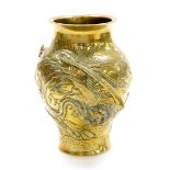 A brass Chinese baluster vase, with applied detailing of storks and vines, with character stamped to