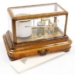 J.J Hicks. An oak cased barograph, the glazed top revealing the barograph with a JJ Hicks maker of L