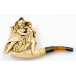A meerschaum pipe, with silver plated ends, and amber cheroot with decorative three neoclassical fig