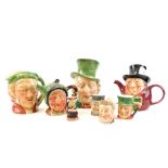 A group of character jugs, to include a Beswick ware Macauber character jug, a Beswick ware Scrooge