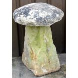 A 19thC staddle stone, with detachable mushroom top on tapered column, 82cm high, 60cm wide.
