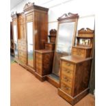 A late Victorian inlaid rosewood bedroom suite, with extensive marquetry in pearwood, satinwood and