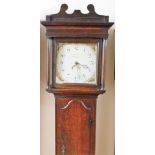 Cavit of Bedford. An early 19thC oak longcase clock, the square painted cream