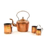 A group of copper wares, to include a copper kettle, a graduated ale three cup set the largest 13cm