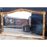 A large rectangular wall mirror, modern in design with gilt decoration and two row glass border, wit