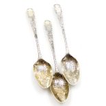 Three Georgian silver teaspoons, each chased and engraved with fruit and flowers, maker's mark TW, b