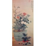A Chinese painted scroll, depicting a jardiniere of flowers, signed an sealed to the upper right, 56
