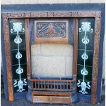 A Victorian fireplace surround, inset with five Art Nouveau type tiles to each side and with an over