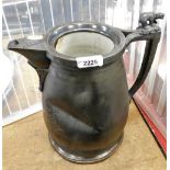 A Meridian Company pewter jug with ceramic inlay, stamped J.S. Simpson 1854, with applied shell deco