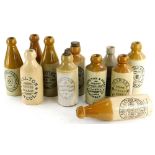 A collection of Lincoln related stoneware ginger bottles, to include Skelton, Draper, Claxton, Rose,