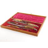 A five piece silver mounted Antler carving set, in fitted oak case.