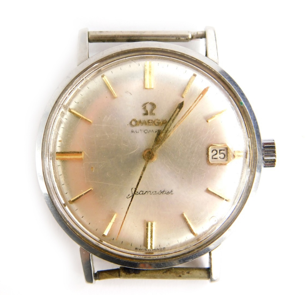 An Omega Seamaster watch head, with silvered dial and gold hands and markers, with date aperture,