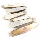 A collection of six 19thC and later fruit knives, each with a mother of pearl handle and a silver
