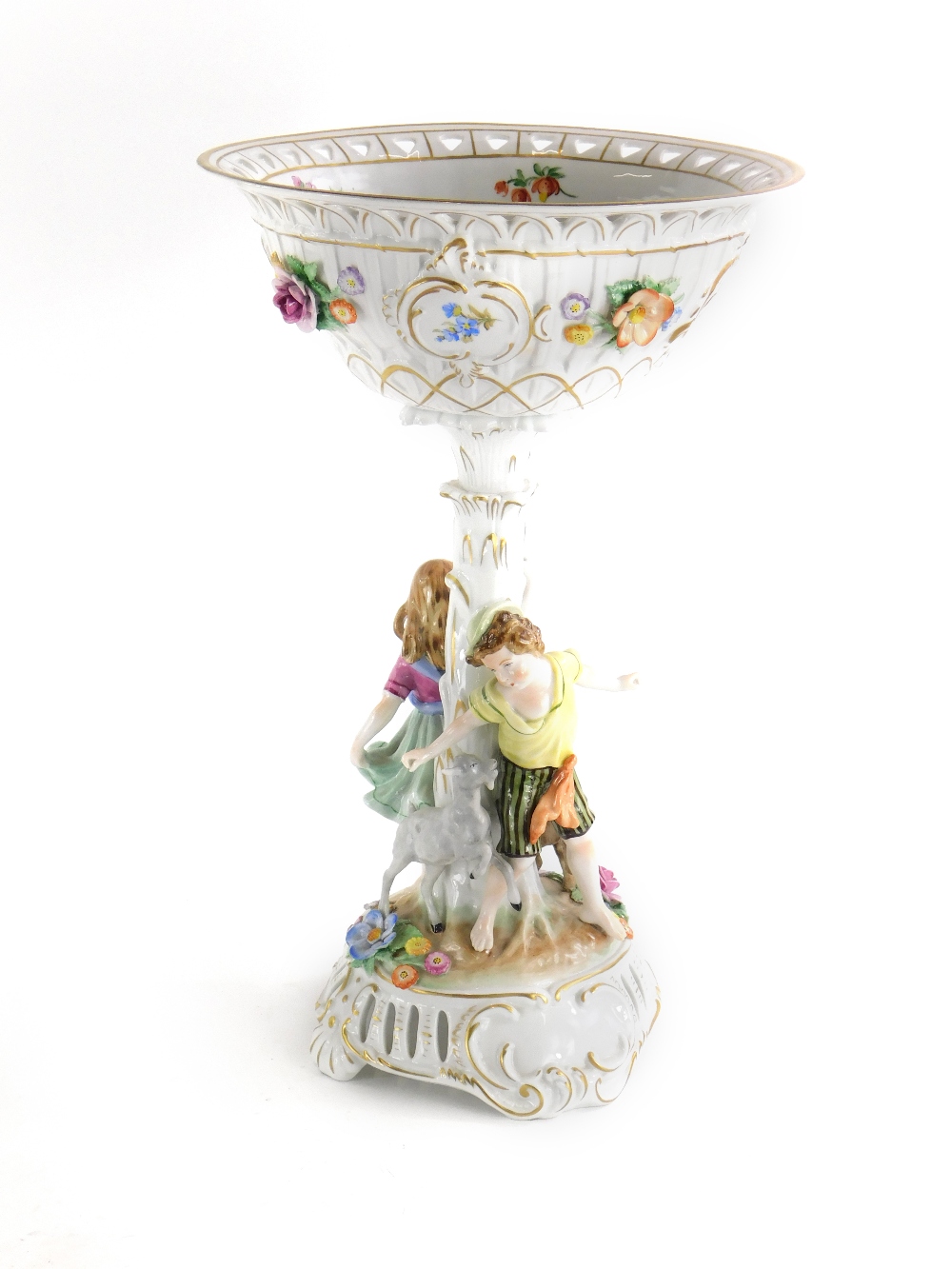 A German porcelain centrepiece, the pierced top flower encrusted and painted and with flowers, on