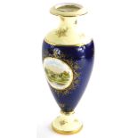 A Coalport porcelain vase, painted with a scene of Buildwas Abbey, Shropshire, within a gilt