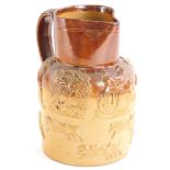 A 19thC stoneware jug, decorated with hounds, huntsmen, windmill etc., impress mark for L Stiff