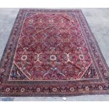 An Indian Mahal carpet, with an all over Heriz type design, with flower heads, medallions, etc.,