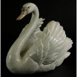 A Lladro porcelain figure of a swan, 20cm long.