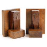 A pair of Art Deco oak bookends, carved as owls, 12.5cm high.