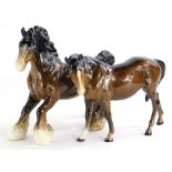 A Beswick ceramic model of a brown horse, and a brown shire. (2)