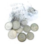 A quantity of nickel silver and silver coins, to include two shillings, sixpences, etc.