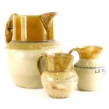 Two stoneware jugs, one stamped Royal Oak, Lincoln, the other Wellington Hotel, Lincoln, and a