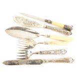 A collection of silver plated items, to include a paper knife, silver plated fish slice and fork