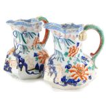 A pair of 19thC Masons type ironstone octagonal jugs, each with a serpent handle, printed to