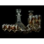 A suite of Bohemian style amber flash glass, to include a square section decanter and stopper, six